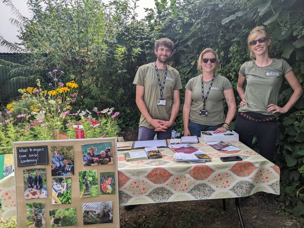 STAA staff promoting social gardening at a recent event